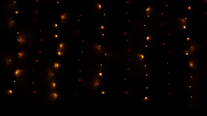 Christmas vertical lights in darkness. Green, red, blue, yellow colours. Blinking from slow pace to fast. Closeup, macro shooting. 4K Ultra HD