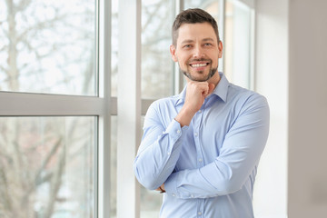 Poster - Portrait of handsome businessman in office