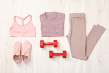 Composition With Sportswear On Wooden Background
