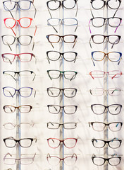 Canvas Print - Glasses showcase in modern optic shop