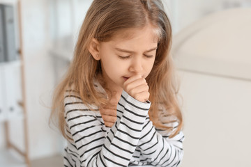 Sticker - Sick little girl visiting doctor in clinic