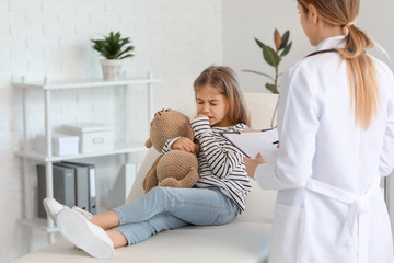 Sticker - Sick little girl visiting doctor in clinic