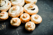 © maxandrew - Freshly harvested mushrooms on the rustic wooden background. Selective focus. Shallow depth of field.