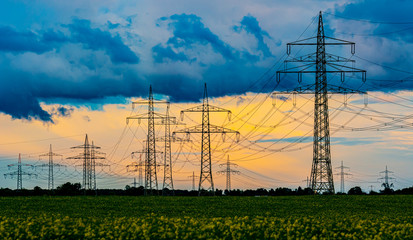 High voltage Power Pylons and Power lines in the field