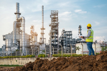 Refinery industry engineer  wearing PPE at refinery construction site