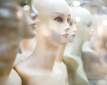 Naked Female Mannequins In The Shop Window.