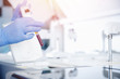 © Parilov - Nurse microbiologist holding test tube with blood for coronavirus 2019-nCoV analyzing
