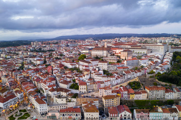 Coimbra drone aerial of beautiful buildings university at sunset, in Portugal