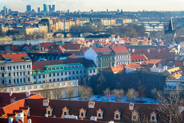 Wall Mural - View of the city and city streets, architecture and roofs houses from above. Prague,