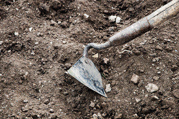 iron glanders on black soil. tool for tillage. plowing the field