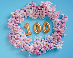 Wall Mural - 100 followers card. Template for social networks, blogs. Background with pink flower petals. Social media celebration banner. 100 online community fans. one hundred subscriber
