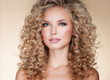 © Svetlana Fedoseeva - Beautiful blonde woman. Healthy Long Blond Hair. Curly Hair. Blond. Permed Hair. Afro curls. Long blond Hair.  Beauty Model Girl with Luxurious Hair.