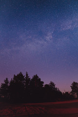 Wall Mural - Landscape with blue Milky Way. Night sky with stars. Beautiful milky way taken in Ukraine during a clear night