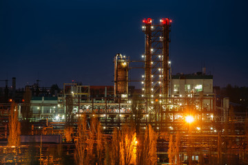 Wall Mural - Chemical factory at summer night. Rectification towers