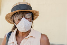 Woman In Face Mask