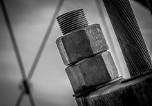 Pair Of Giant Nuts On Bridge Cable Supports On A Bridge In Southern Oregon - Black And White