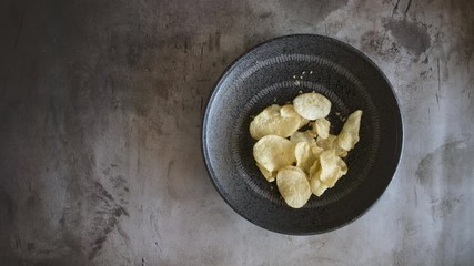 Canvas Print - Stop Motion Animation of Potato Chips Disappearing from a Bowl