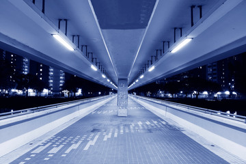Poster - Empty foot bridge and pedestrian walkway at night