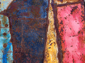 Colorful old painted steel sheets abstract background.
