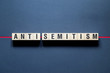 Anti - Semitism word concept on cubes