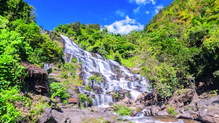 Wall Mural - 4K, Time lapse Waterfalls in beautiful and great forests Mae Ya Waterfall Chiang Mai Province Thailand