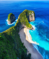 Wall Mural - aerial view at sea and rocks. turquoise water background from top view. summer seascape from air. ke