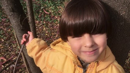 child in the wood, slow motion, close up 4k people video