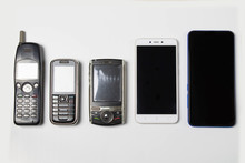 Evolution Of Cell Phones On White Background