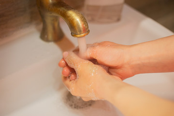 Wall Mural - Hand wash with soap, cleanliness and hygiene
