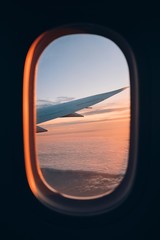 Beautiful sunset look through airplane window