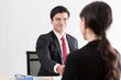 © Joeahead - A businessman finish and handshake to candidate woman answers for a job interview.