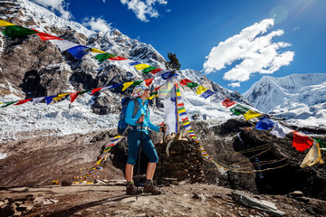 Wall Mural - Hiker enjoys the view in the Himalayan mountains