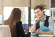 Businesspeople talking during an interview at office