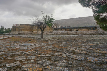 Wall Mural - Knossos, Crete, Greece: Tourists explore the ruins of the Knossos Palace, a Minoan archaeological site on the Aegean Island of Crete.