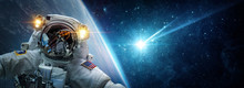 Astronaut In Orbit Of Planet Earth Against The Background Of A Falling Meteorite, Asteroid, Comet. The Concept On The Theme Apocalypse, Armageddon, Doomsday,. Elements Of This Image Furnished By NASA.