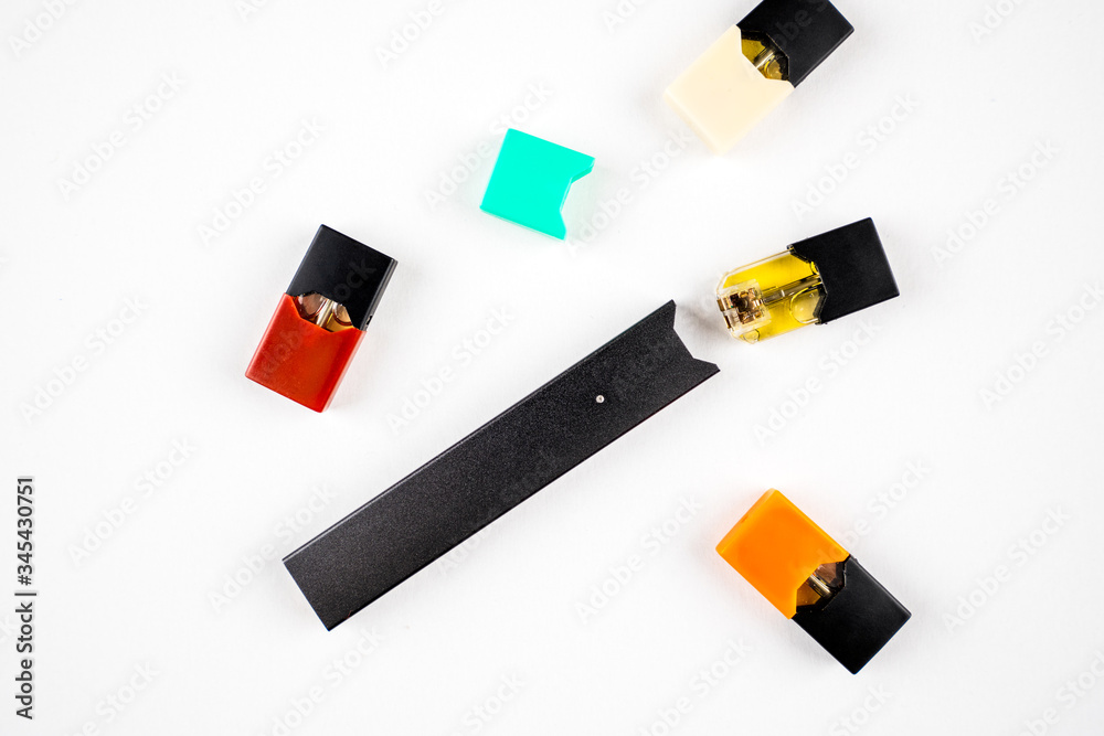 Oslo, Norway - 05.01.2020: Juul vape and juul flavoured pods isolated on  white background. To illustrate an alternative to ordinary cigarettes and  nicotine. Stock Photo | Adobe Stock