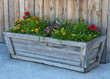 Wooden Planter against wood fence