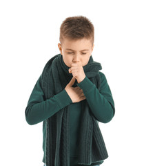 ill coughing little boy on white background