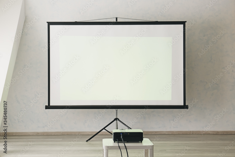 Room with projector prepared for conference in office