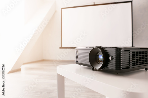 Video projector on table in conference hall Poster Mural XXL