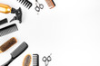 © 9dreamstudio - Hairdressing instruments. Combs, scissors on white table top view frame copy space