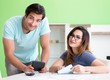 © Elnur - Young family struggling with personal finance