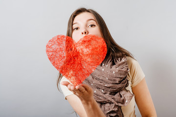 Love and valentines day woman holding heart