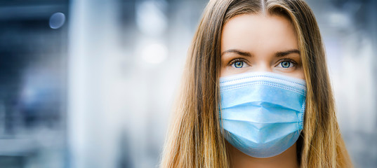 Woman in face mask copy space for text. Coronavirus flu epidemic travel of the city concept wide banner panorama