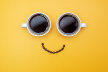 Smile Coffee (Smiley Look Made From Two Cups Of Coffee And Coffee Beans)
