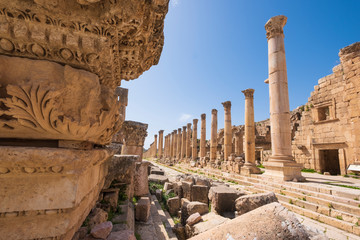 a stone ornament of column base on the ruins of the city of Jerash in Jordan in spring