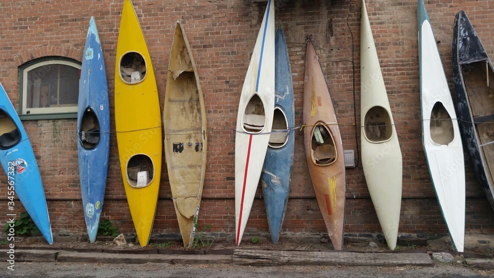 Kayaks In A Row - obrazy, fototapety, plakaty 