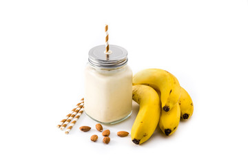 Wall Mural - Banana smoothie with almond in jar isolated on white background	