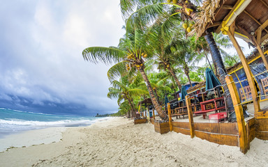 Beautiful beach of Honduras on a cloudy day