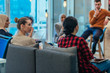 © qunica.com - Business meeting between multi ethnic colleagues in a modern startup company.